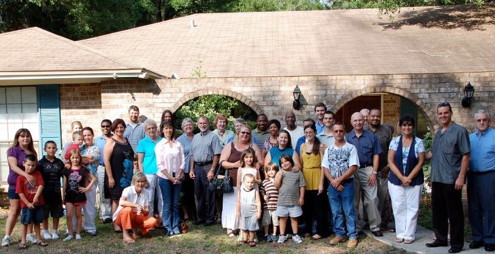 Clay SafetyNet Alliance partners and families outside the first Mercy Support Services group home